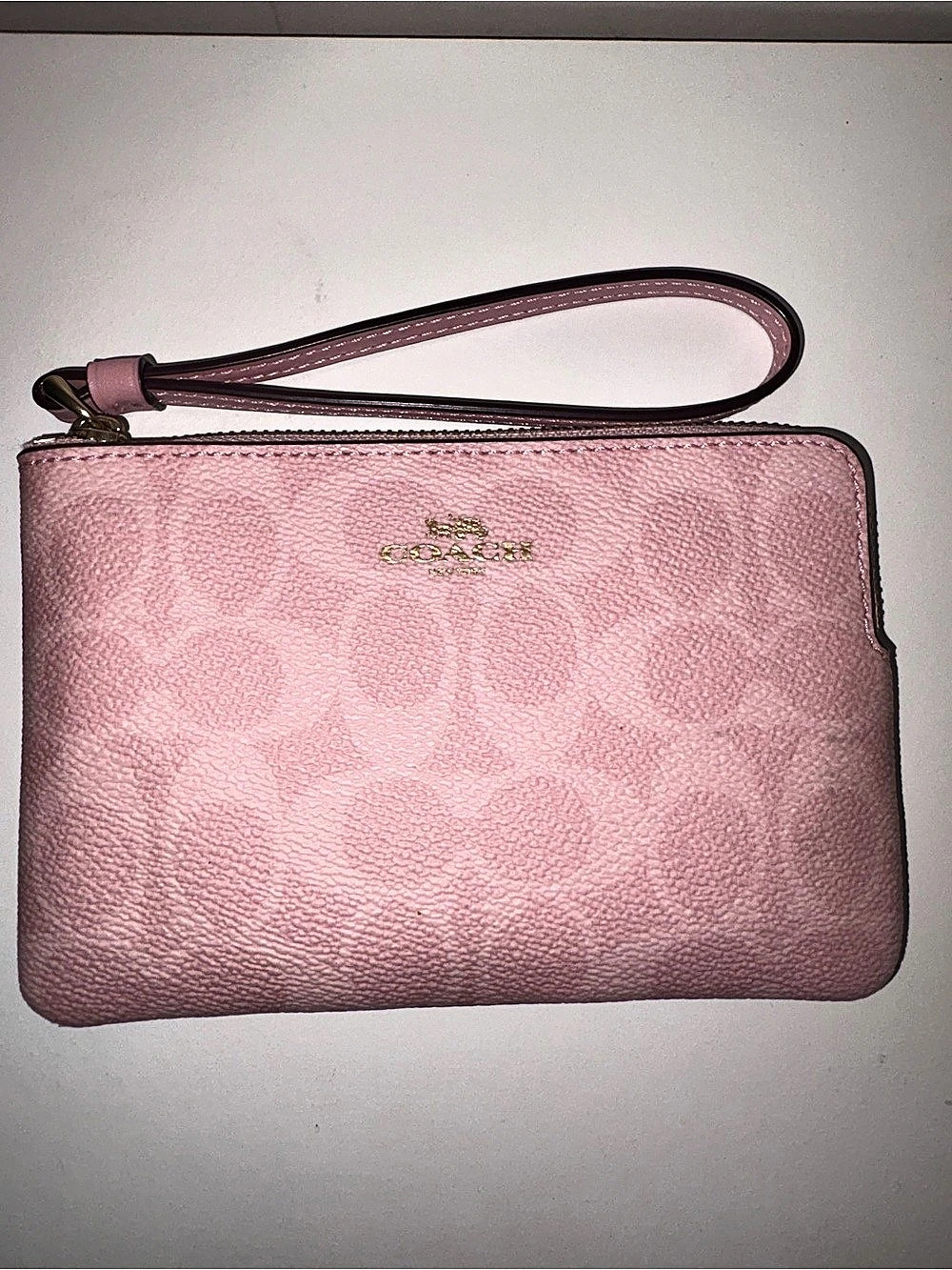 Coach Corner Zip Wristlet In Signature Canvas Pink